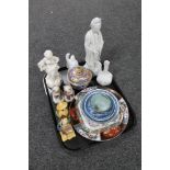A tray of Parian figure of a girl with basket, Oriental figures,