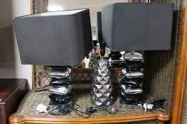 Two two-tone metal table lamps and shades and a further lamp