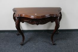 A reproduction mahogany shaped hall table on cabriole legs CONDITION REPORT: Width