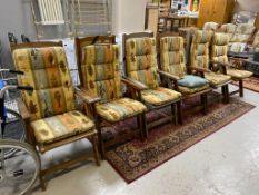 A set of six teak folding garden lounger chairs with cushions (a/f)