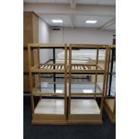 Two square four tier shop display stands (two glass panels missing)