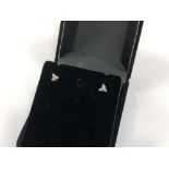 A pair of 14ct gold diamond set earrings