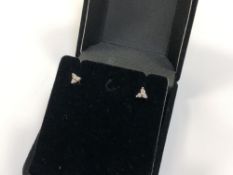 A pair of 14ct gold diamond set earrings