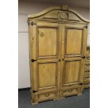 A Barker & Stonehouse pine double door wardrobe,