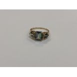 A 10ct gold mystic topaz and diamond ring, size P CONDITION REPORT: Stamped 10K,