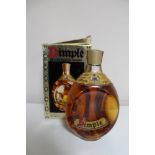 A bottle of John Haig Dimple Deluxe Scotch Whisky 26 2/3 fl. oz.