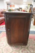 A George III hanging corner cabinet