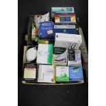 A box and a crate of assorted electricals, kettles, irons, light bulbs, Britta filter,