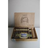 An El Guajiro wooden cigar box containing twenty-two cigars