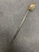 A 19th century naval officer's sword with brass guard