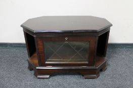 An inlaid mahogany corner TV stand
