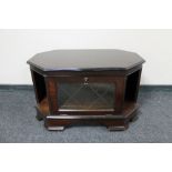 An inlaid mahogany corner TV stand