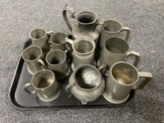 A tray of antique pewter ware - tankards, coffee pot,