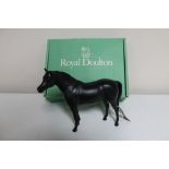 A boxed Royal Doulton horse in black matte finish