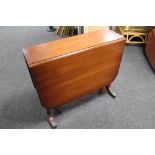 A mahogany drop leaf table CONDITION REPORT: 89cm long by 43cm wide by 76cm high