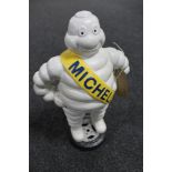 A cast iron figure - Michelin man