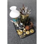A tray of brass and china electric oil lamp with shade, brass embossed stick pot,