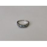 A 9ct white gold green paste set ring, size P1/2, 3.1g.