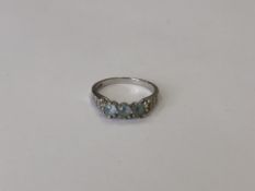 A 9ct white gold green paste set ring, size P1/2, 3.1g.