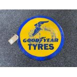 A circular enamelled Goodyear Tyres sign CONDITION REPORT: This sign has some age,