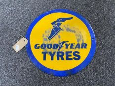 A circular enamelled Goodyear Tyres sign CONDITION REPORT: This sign has some age,