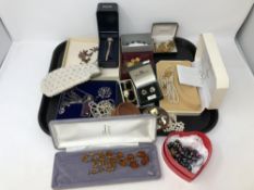 A tray of costume jewellery, wristwatches, simulated pearls,