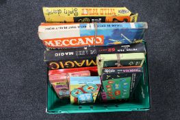 A box of vintage board games,