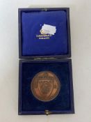 A cased bronze National Rifle Association medal