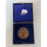 A cased bronze National Rifle Association medal