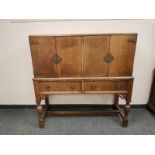 A good quality oak cocktail sideboard,