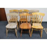 Six assorted pine dining chairs