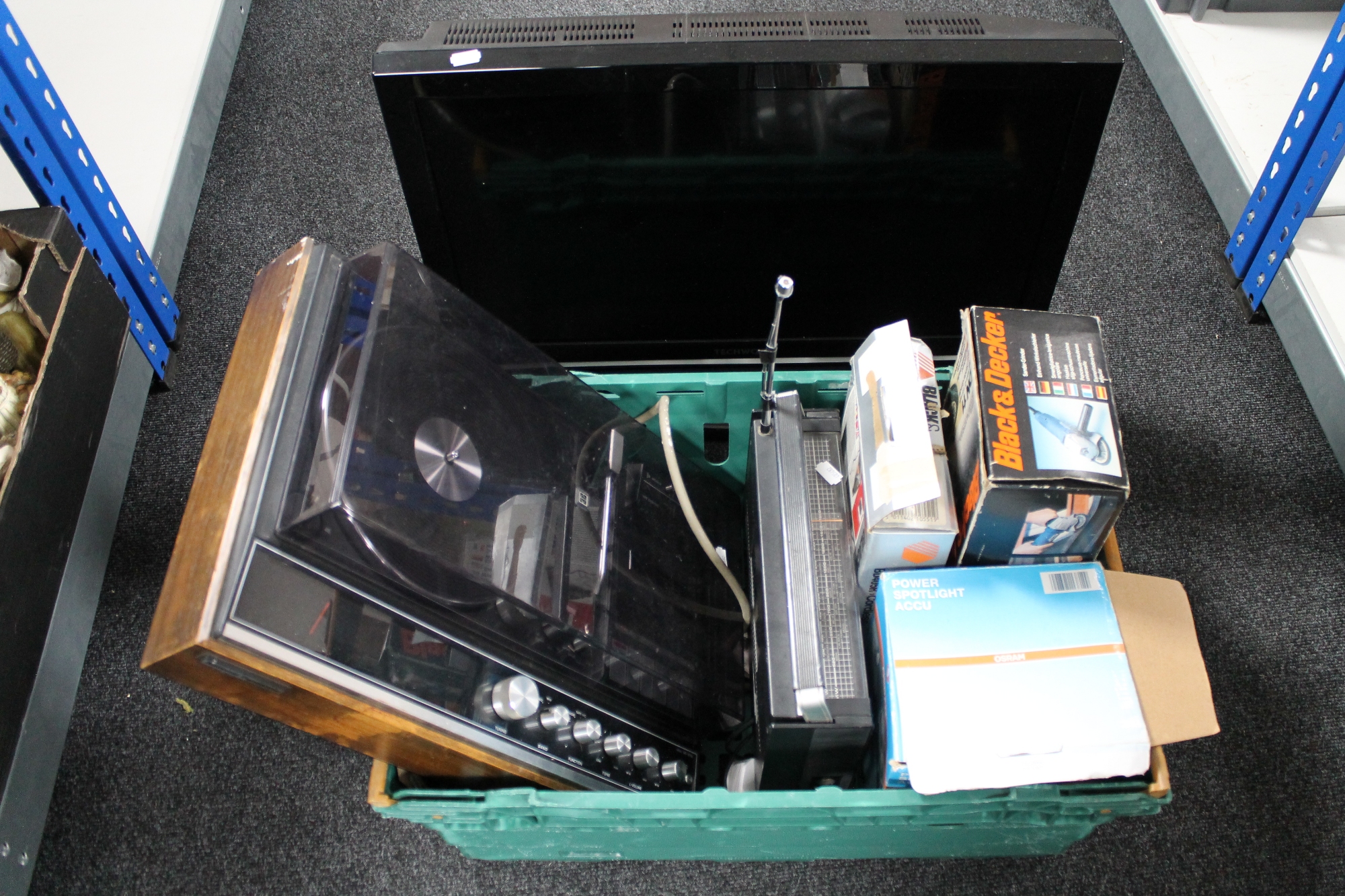 A crate of National Panasonic stereo, Tandy astronaut radio, spot light, black and decker drill,