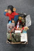 A box of toys, Monkey soft toy, Action man, battery operated tanks,