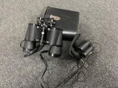 A set of cased Panorama 10 x 50 binoculars together with a pair of cased Jessop 8 x 21 field