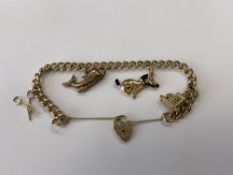 A 9ct gold padlock charm bracelet, 21.7g.