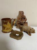 A tray of Mouseman style oak ashtray, soapstone carving, mohair bear,