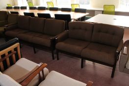 A mid century Danish stained beech three seater and two seater settees in brown fabric