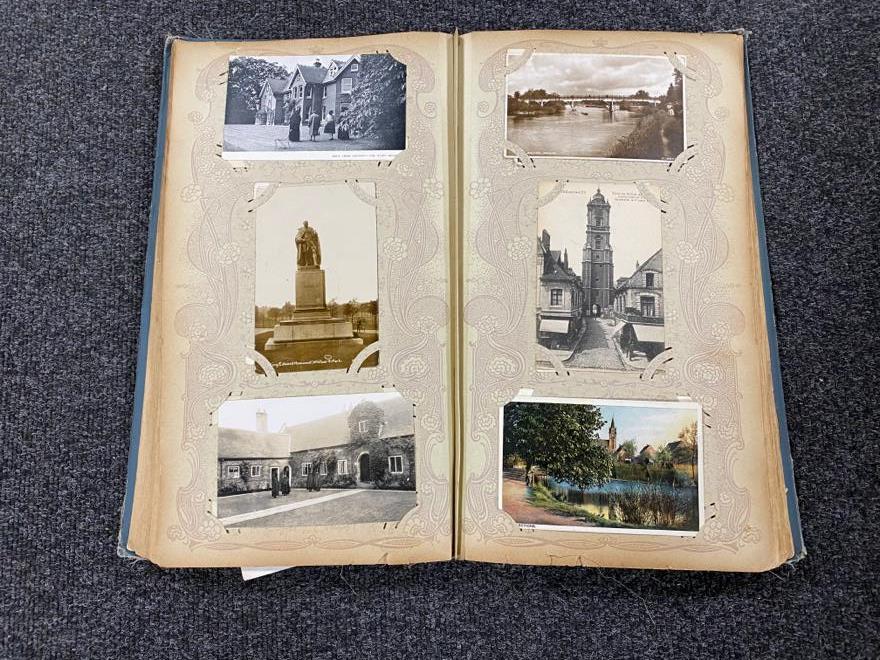 An early twentieth century photo album containing monochrome and colour photographs including