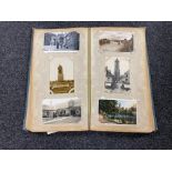 An early twentieth century photo album containing monochrome and colour photographs including