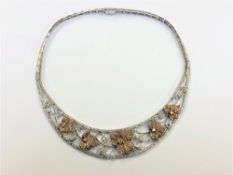 An impressive 18ct white and rose gold diamond set necklace,