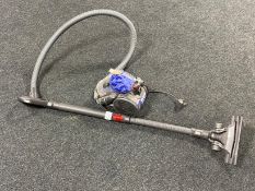 A Dyson DC 26 vacuum cleaner