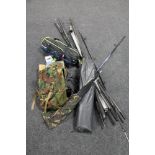 A box and basket of fishing equipment : rods, stands, reels, fishing bag,