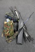 A box and basket of fishing equipment : rods, stands, reels, fishing bag,