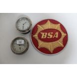 Two circular Smiths clocks and a BSA metal plaque CONDITION REPORT: The sign is a