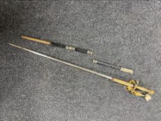 An antique court sword with etched blade,