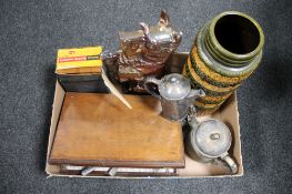 A box of early twentieth century cast iron Scotty dog fire companion set, West German vase,