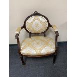 A reproduction mahogany armchair,