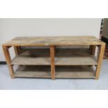 A pine three tier work bench, 60.5 cm deep. 184 cm wide and 77 cm height.