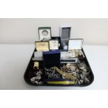 A tray of a quantity of costume jewellery, lady's wristwatches, watch straps,
