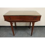 A mid 20th century cutlery table,